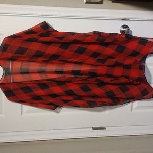 Red and black light weight wrap - open in front with opening for arms.